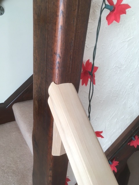 top of balustrade showing careful cutting in around existing curved newel